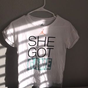 White, she got game,  basketball tee shirt